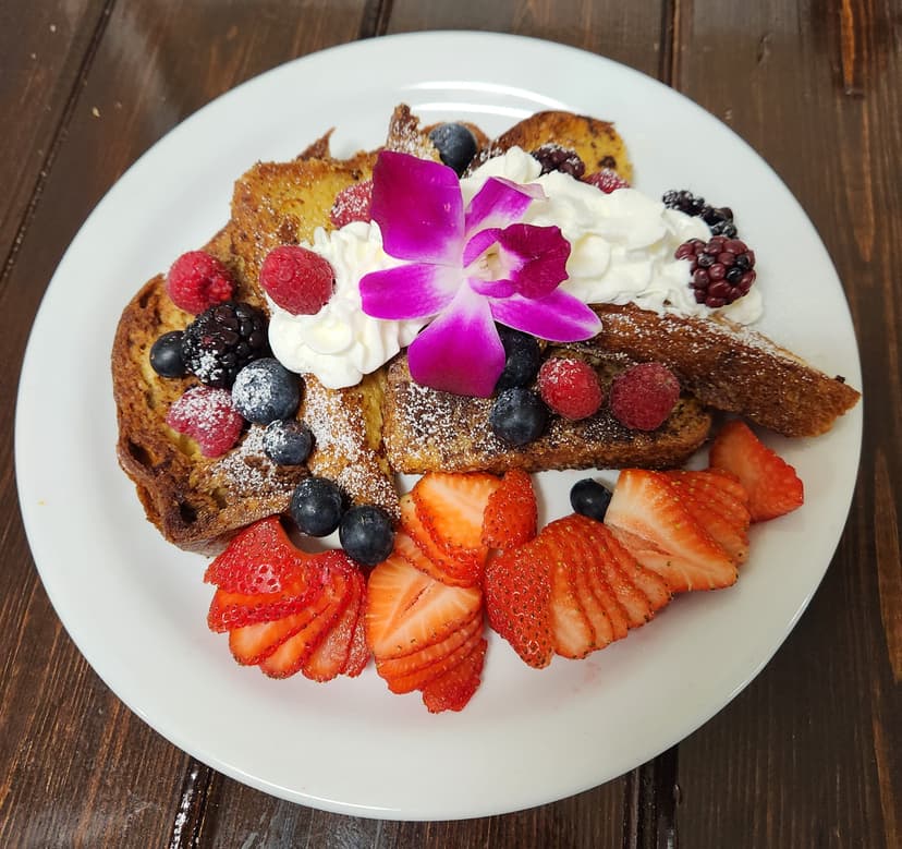 Victory French Toast with fresh berries and whipped cream